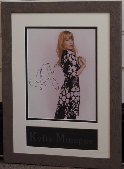 Kylie Minogue signed 10 x 8