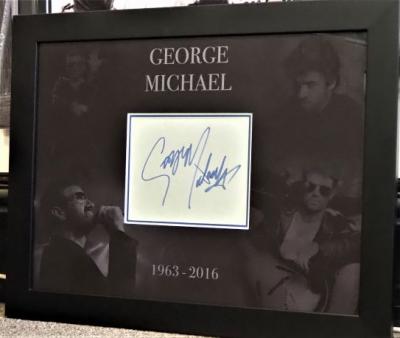George Michael signed page
