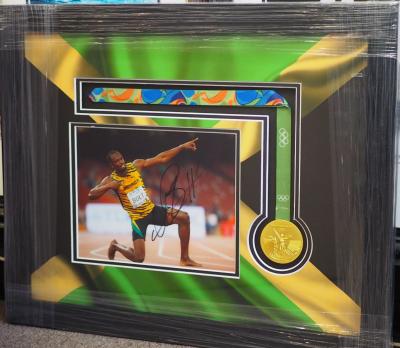 Usain Bolt signed 10 x 8 photo