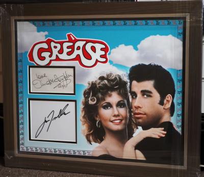 Grease double signed display